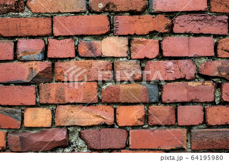 Close up of red brick wall. 64195980