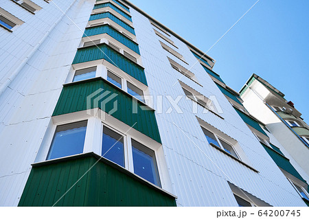 facade of a new multi-storey building with white 64200745