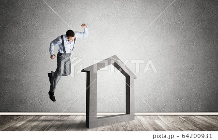 Stone home silhouette in empty room as symbol for real estate insurance Stone home silhouette in empty room as symbol for real estate insurance 64200931