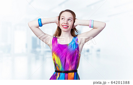 Redhead beautiful girl closing her ears with hands Redhead beautiful girl closing her ears with hands 64201388