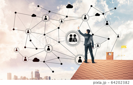 Businessman on house roof presenting networking and connection c Businessman on house roof presenting networking and connection c 64202382