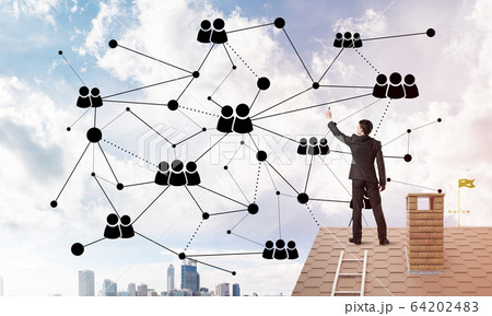 Businessman on house roof presenting networking and connection concept. Mixed media Businessman on house roof presenting networking and connection concept. Mixed media 64202483