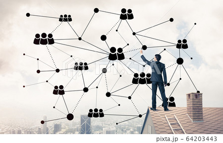 Businessman on house roof presenting networking and connection c Businessman on house roof presenting networking and connection c 64203443
