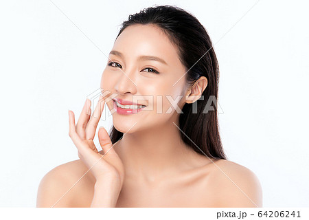 Beautiful Young Asian Woman with Clean Fresh Skin. Face care, Facial treatment, Cosmetology, beauty Beautiful Young Asian Woman with Clean Fresh Skin. Face care, Facial treatment, Cosmetology, beauty 64206241