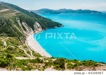 Famous Myrtos Beach. Must see visiting tourism location on Kefalonia island in summer. Greece 64206967