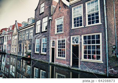 Street in historic Delft, Holland 64208873
