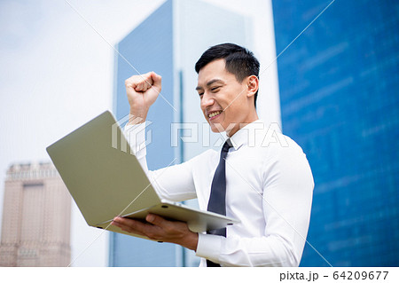 Successful asian business man Successful asian business man 64209677