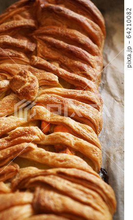 Meat pie with puff pastry. Beautiful golden crust. Tasty Lunch 64210082