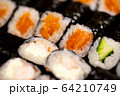 Thin rolls with salmon,cucumber,shrimp close up 64210749