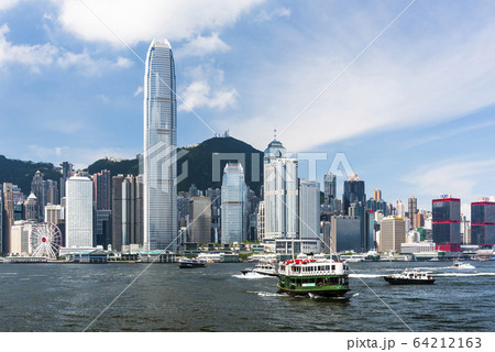Star Ferry on the way to Central Pier harbor with hong kong's skyscrapers in the background 64212163