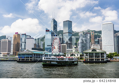 Star Ferry on the way to Central Pier harbor with hong kong's skyscrapers in the background Star Ferry on the way to Central Pier harbor with hong kong's skyscrapers in the background 64214848