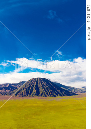 Volcanic landscape against blue sky with clouds. Bromo Tengger S 64214874