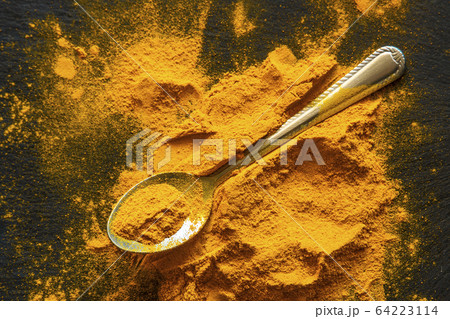 fresh turmeric powder. natural antioxidant 64223114