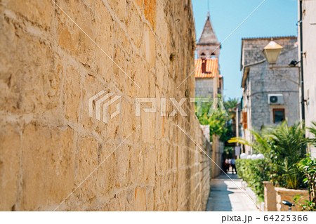 Historic town Trogir street in Trogir, Croatia 64225366