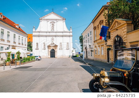 Saint Catherine of Alexandria church and upper town street in Zagreb, Croatia 64225735