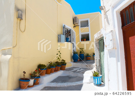 Pyrgos town colorful road in Santorini island, Greece Pyrgos town colorful road in Santorini island, Greece 64226595