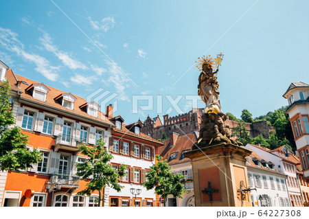 Old town Kornmarkt square and Heidelberg castle in Heidelberg, Germany 64227308