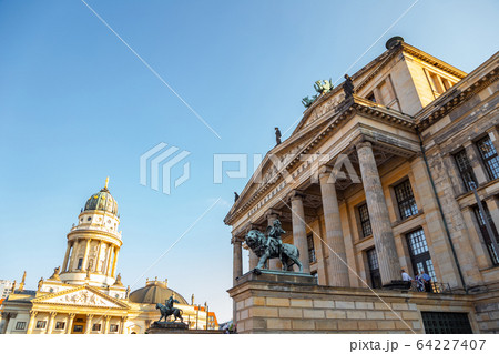 Konzerthaus Berlin concert hall and German Cathedral The New Church (Neue Kirche, Deutscher Dom)on Gendarmenmarkt square in Berlin, Germany Konzerthaus Berlin concert hall and German Cathedral The New Church (Neue Kirche, Deutscher Dom)on Gendarmenmarkt square in Berlin, Germany 64227407