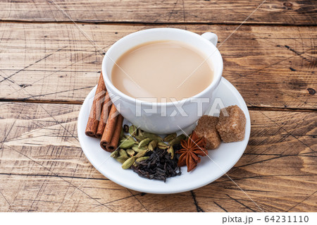 Indian drink masala tea with milk and spices. 64231110