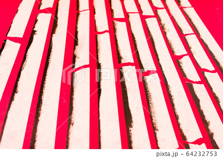 close up of an adhesive tape on red background close up of an adhesive tape on red background 64232753