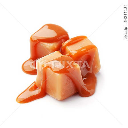 Caramel candies  isolated on white backgrounds. 64235184