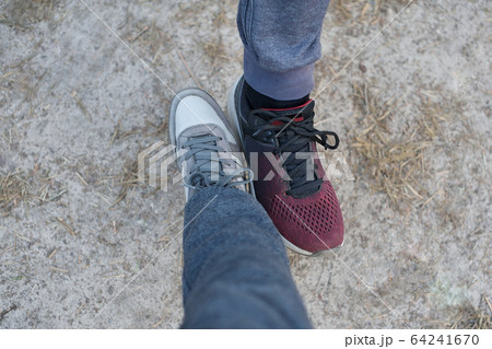 Male and female say hello by legs during Male and female say hello by legs during 64241670