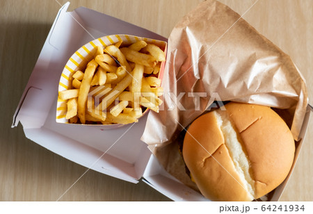 french fried chips in paper wrapper french fried chips in paper wrapper 64241934