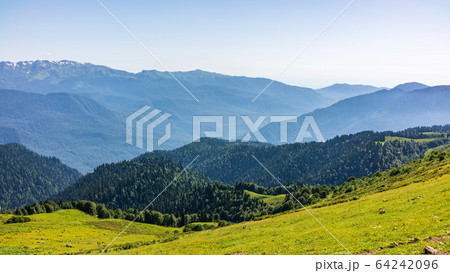 View over the Green Valley, surrounded by high mountains View over the Green Valley, surrounded by high mountains 64242096