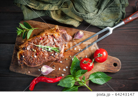 Beef steaks rib eye fried on grille 64243147