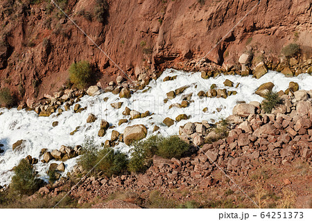 Water in the mountain raging river. 64251373