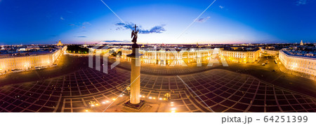Aerial front view at the Winter Palace building in white nights, exterior Palace Square and Aleksandr Column at summer. Top view from drone. Saint-Petersburg, Russia 64251399