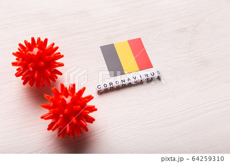 Abstract virus strain model of 2019-nCoV middle East respiratory syndrome coronavirus or coronavirus COVID-19 with text and flag Belgium on white background. Virus pandemic protection concept. 64259310