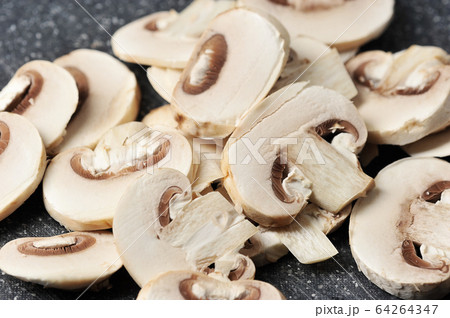 fresh mushrooms cut into pieces 64264347