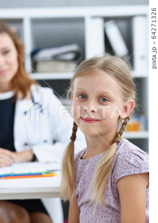 Little child at pediatrician reception Little child at pediatrician reception 64271326