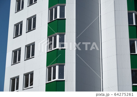 facade of a new multistory building with white and facade of a new multistory building with white and 64275261