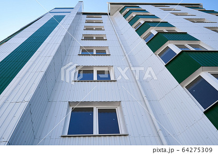 facade of a new multi-storey building with white 64275309