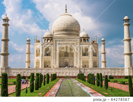 Stunning view of Taj Mahal and its minarets in a bright sunny day, Agra, Uttar Pradesh, India 64278567