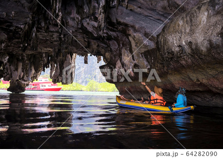 tourist canoe through small cave, Phang Nga tourist canoe through small cave, Phang Nga 64282090