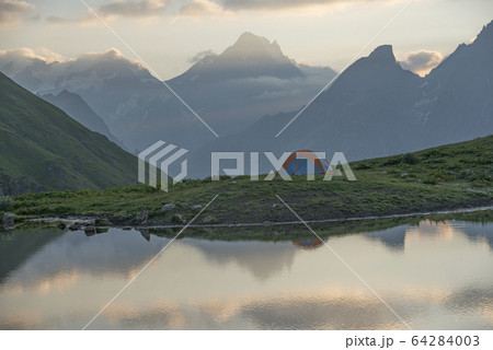 Tent in mountains Tent in mountains 64284003