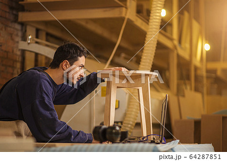 cerpenter checking wooden chair after grinding cerpenter checking wooden chair after grinding 64287851