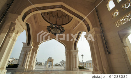 View of white domes of main entrance to Presidential Palace, with designed floor. 64288082