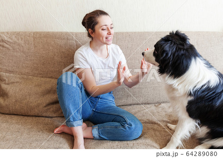 Stay Home Stay Safe. Smiling young attractive 64289080