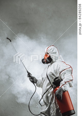 professional disinfector fully armed with necessary equipment 64289208