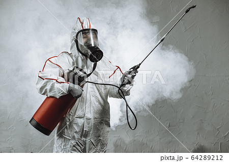 disinfector wearing protective biological suit and gas-mask conduct disinfection disinfector wearing protective biological suit and gas-mask conduct disinfection 64289212