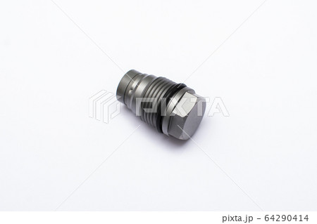 The pressure-limiting valve the fuel rail isolated on white background. The pressure-limiting valve the fuel rail isolated on white background. 64290414