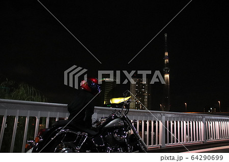 スカイツリーとフラムドールとバイク夜景の写真素材