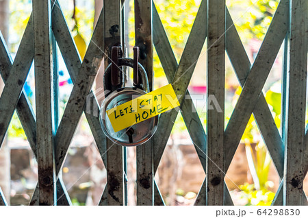 Lets stay home sticker on door lock gate. Stay at Home Lets stay home sticker on door lock gate. Stay at Home 64298830