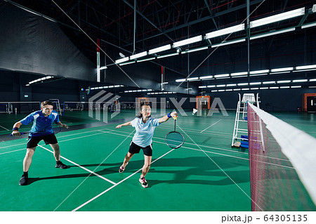 Mixed double playing badminton 64305135