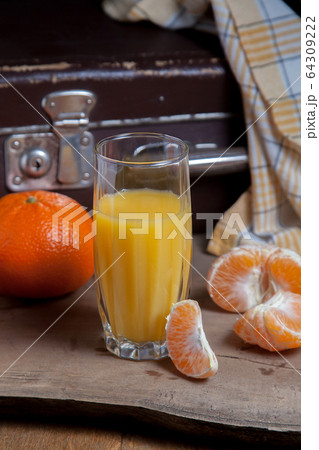 Unpeeled round ripe orange mandarins or Unpeeled round ripe orange mandarins or 64309222