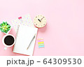 Notebook, clock, pen and coffee cup on pink background with copy space ready for adding or mock up 64309530